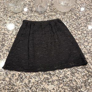 Black lace skirt. Mid-thigh length